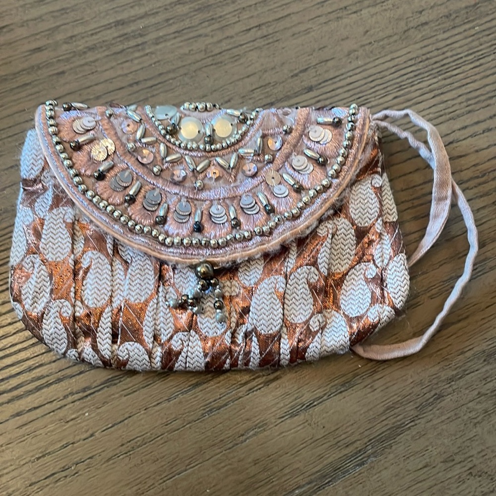 Rose gold beaded clutch